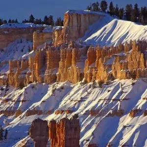 Snow frosted sandstone rock formations in February in Bryce Canyon